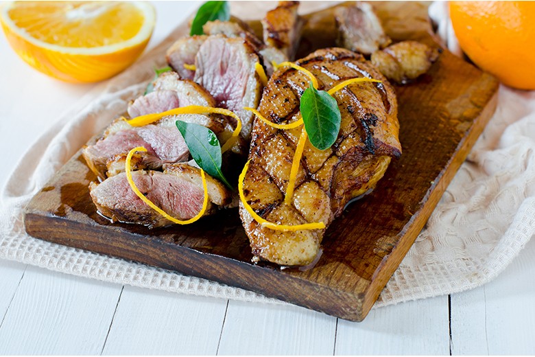 Ente mit geschmorten Orangen