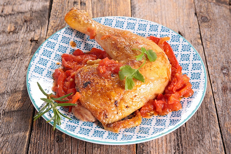 Hähnchenkeulen mit Tomaten