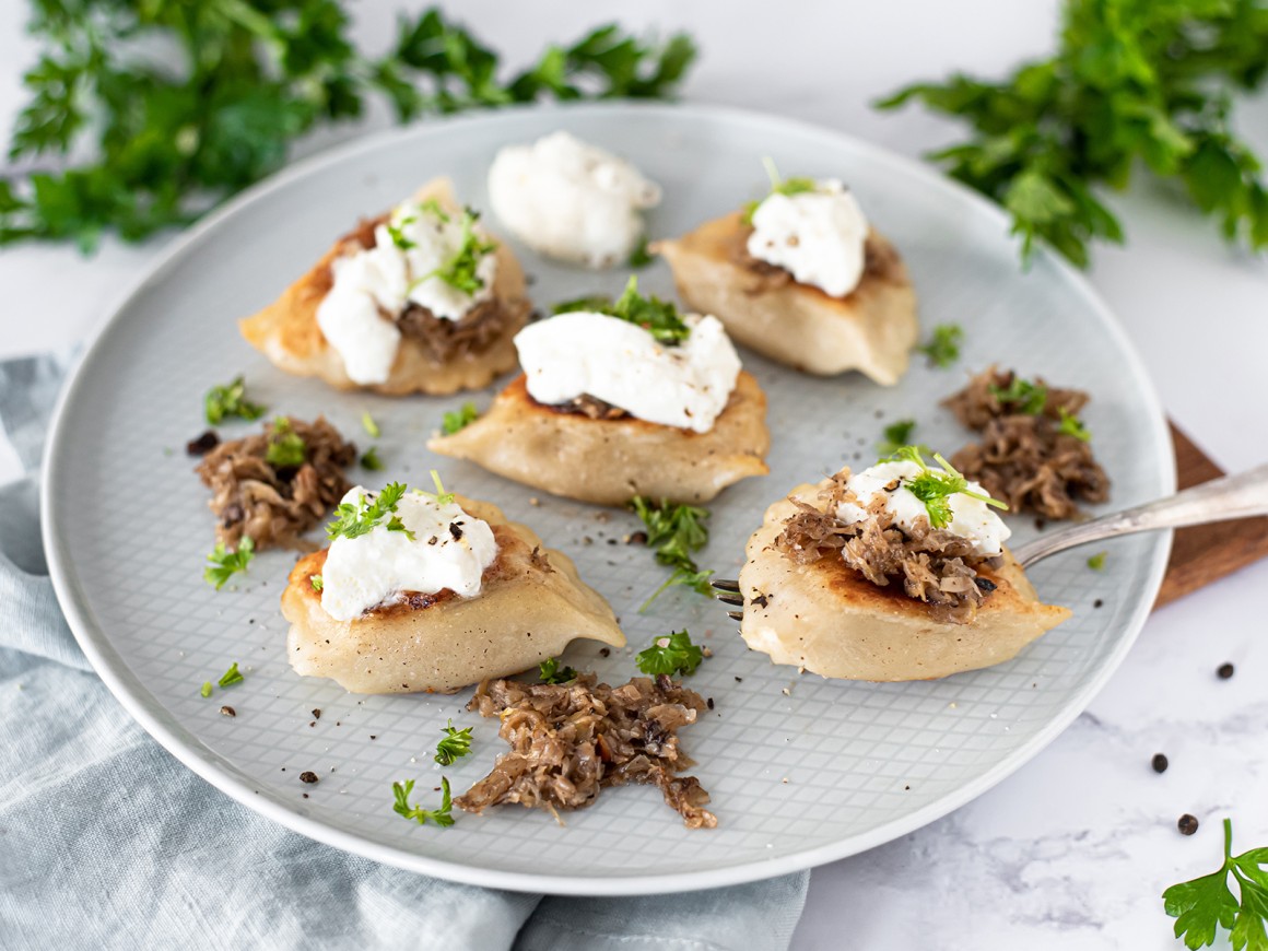 Piroggen mit Sauerkraut und Pilzen - Rezept