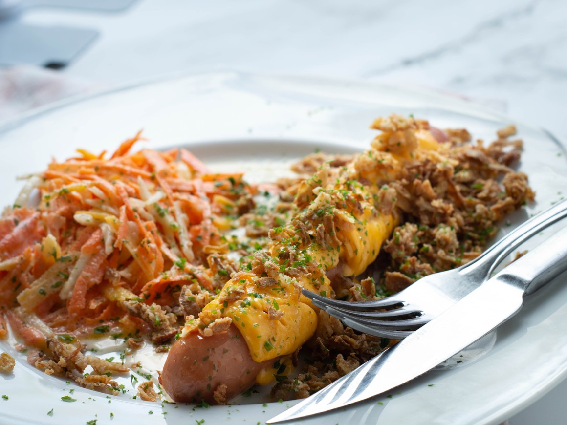 Käsewürste mit Röstzwiebeln